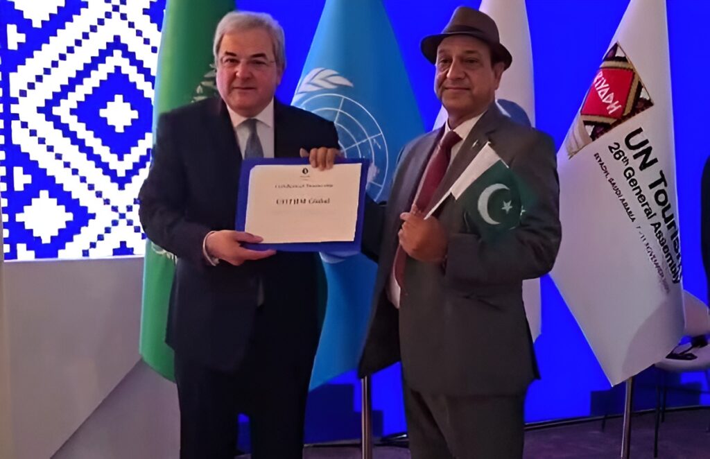 Ahmad Shafiq receiving UN Tourism Certificate